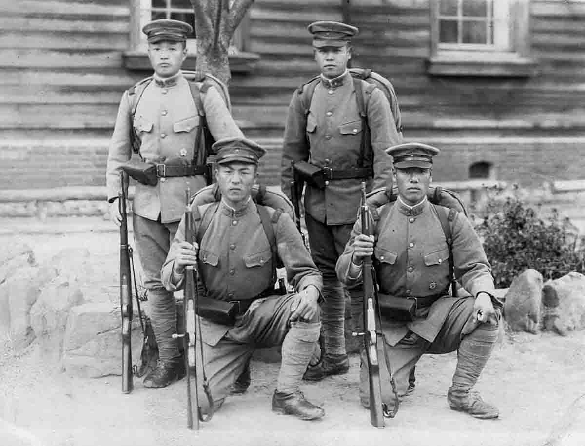 These Japanese soldiers are probably members of a crew-served weapons team. Note that they all have Type 38 6.5mm carbines.